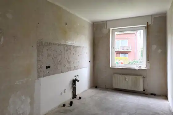 Raum in Mietwohnung vor der Sanierung; Rohbau